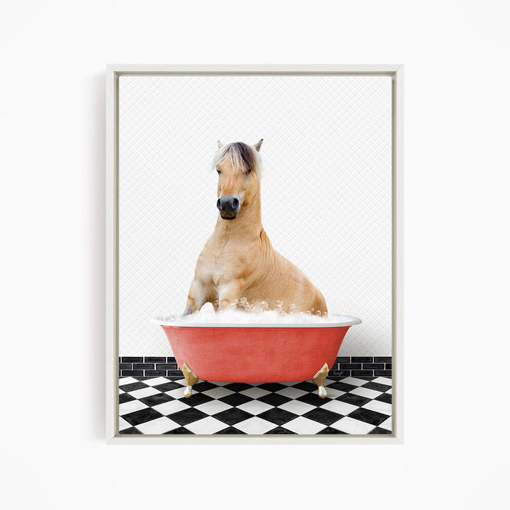 A light brown horse is sitting in a red bathtub filled with water, surrounded by a black and white checkered floor.