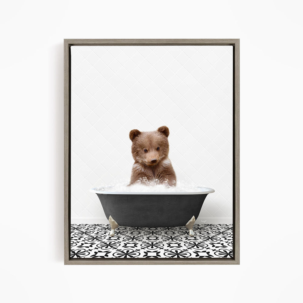 A cute brown bear sitting in a bathtub filled with water, surrounded by a black and white patterned tile floor.