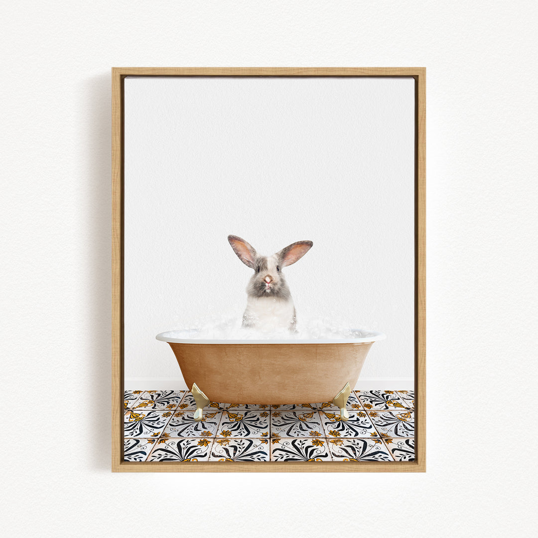 A white rabbit sitting in a bathtub filled with water, surrounded by a patterned tile floor.