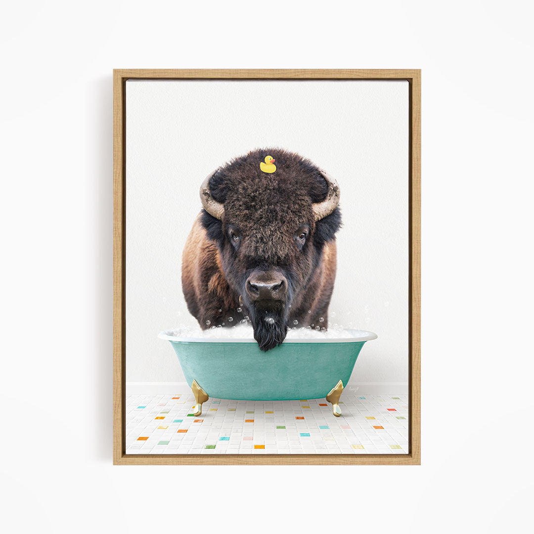 A buffalo with a yellow rubber duck sitting in a blue tub, creating a whimsical and playful scene.