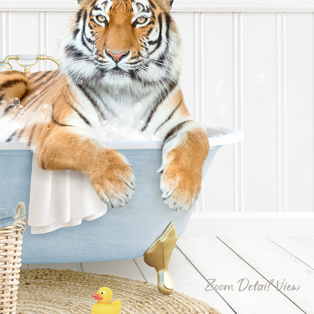 A tiger is sitting in a bathtub filled with water, surrounded by a yellow rubber duck and a white basket.