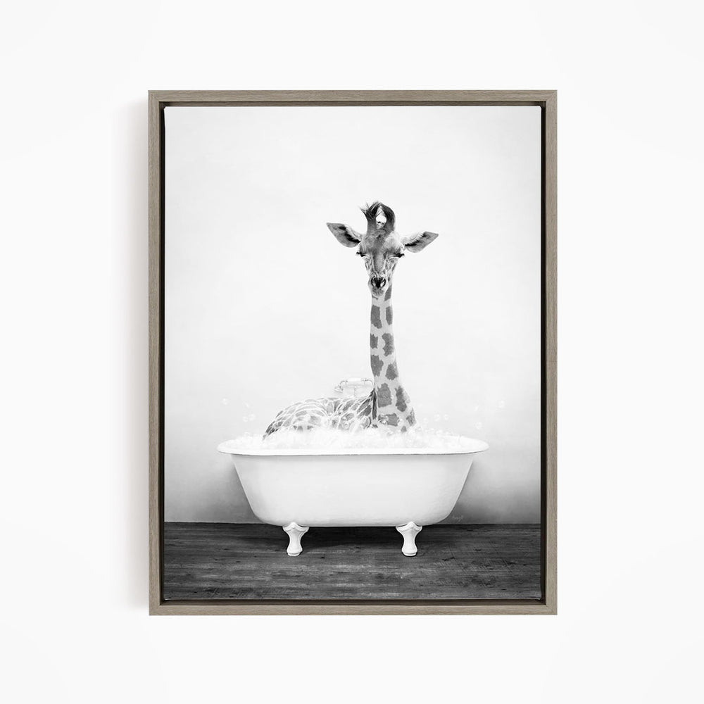 A giraffe sitting in a bathtub filled with water, creating a whimsical and playful scene.