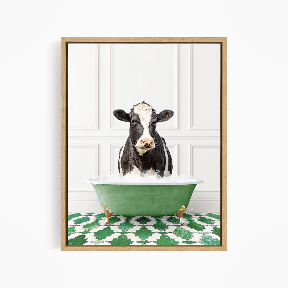 A black and white cow is standing in a green bathtub filled with water, creating a whimsical and humorous scene.