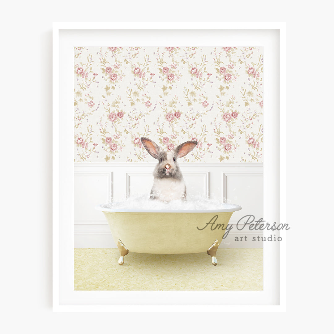 a rabbit sitting in a bathtub with flowers on the wall behind it