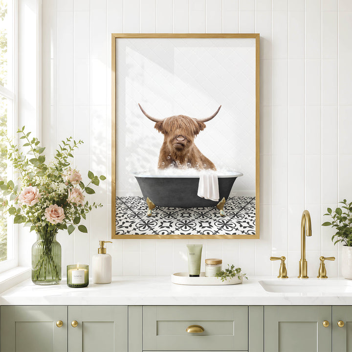 a bathroom scene with a framed picture of a Highland cow sitting in a bathtub, surrounded by flowers and a decorative vase.