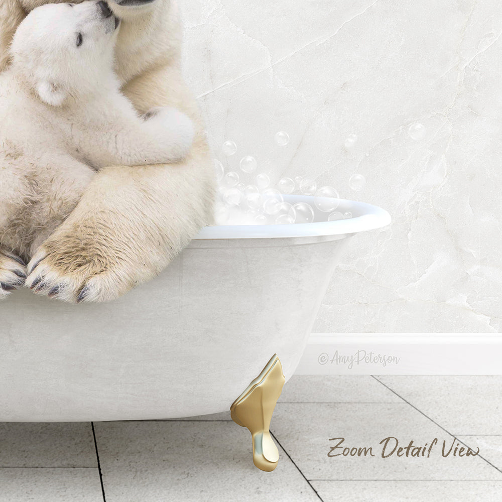 A polar bear cub sitting in a white bathtub filled with bubbles, with bubbles floating around the bear.