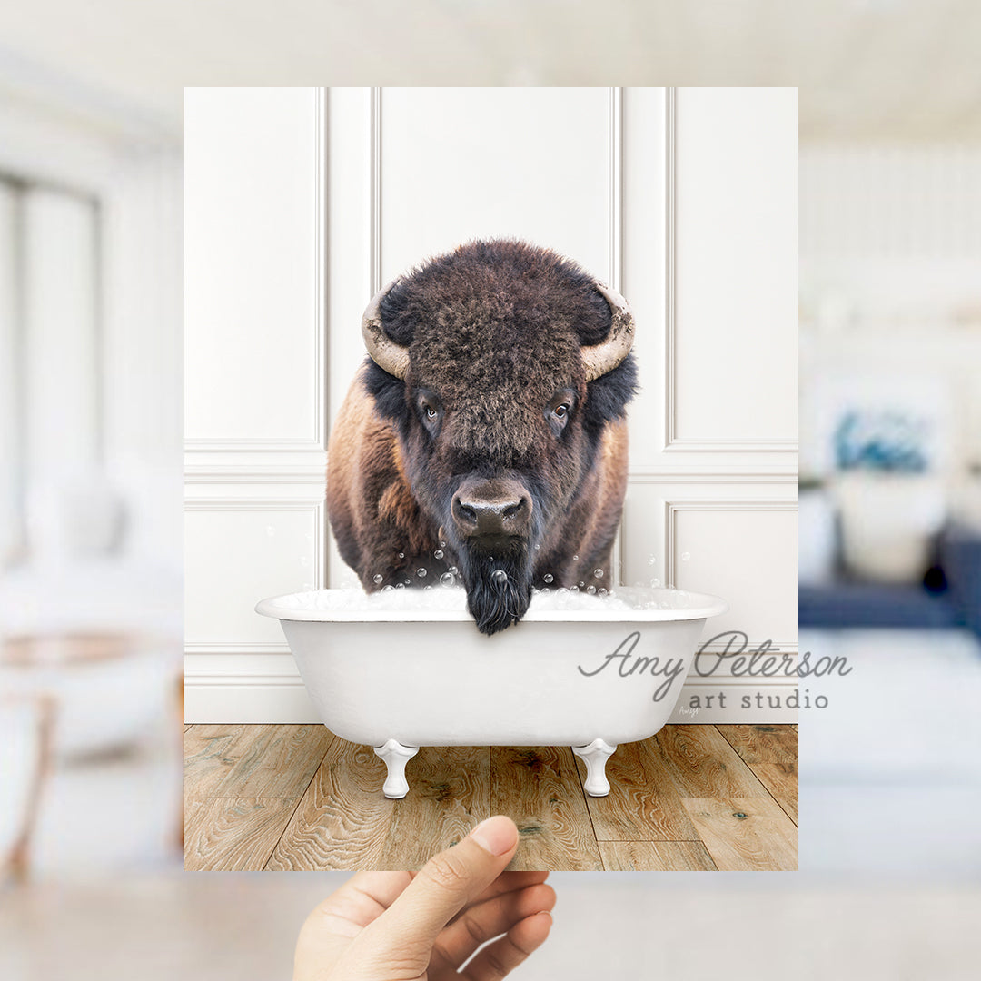 a bison is standing in a bathtub with his head sticking out of the tub