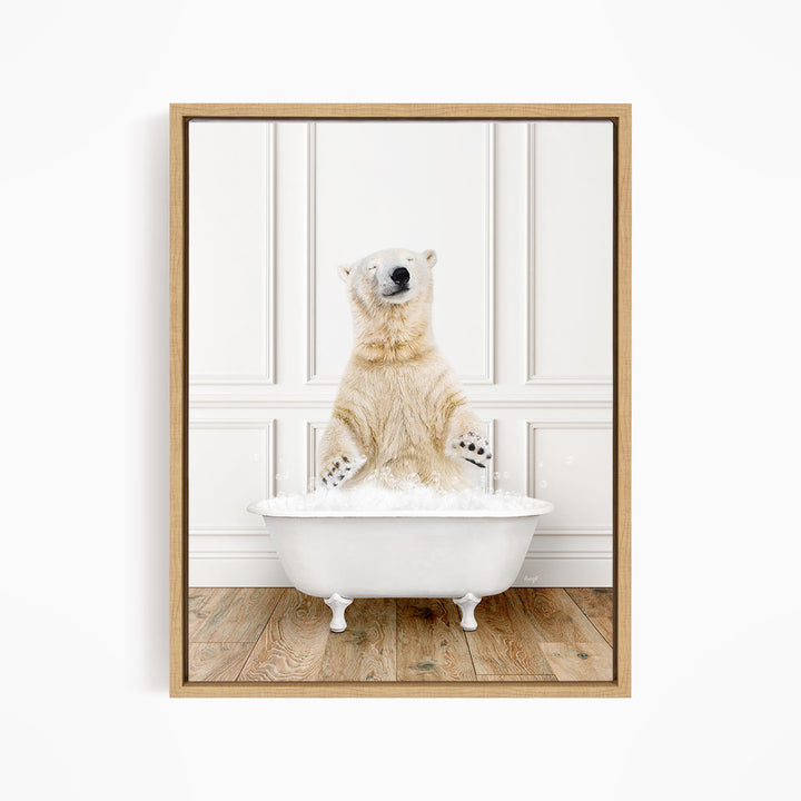 A polar bear is sitting in a white bathtub filled with water, appearing to enjoy the bath.
