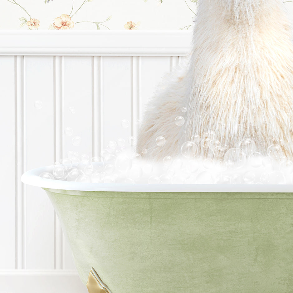 a white dog sitting in a bathtub filled with bubbles