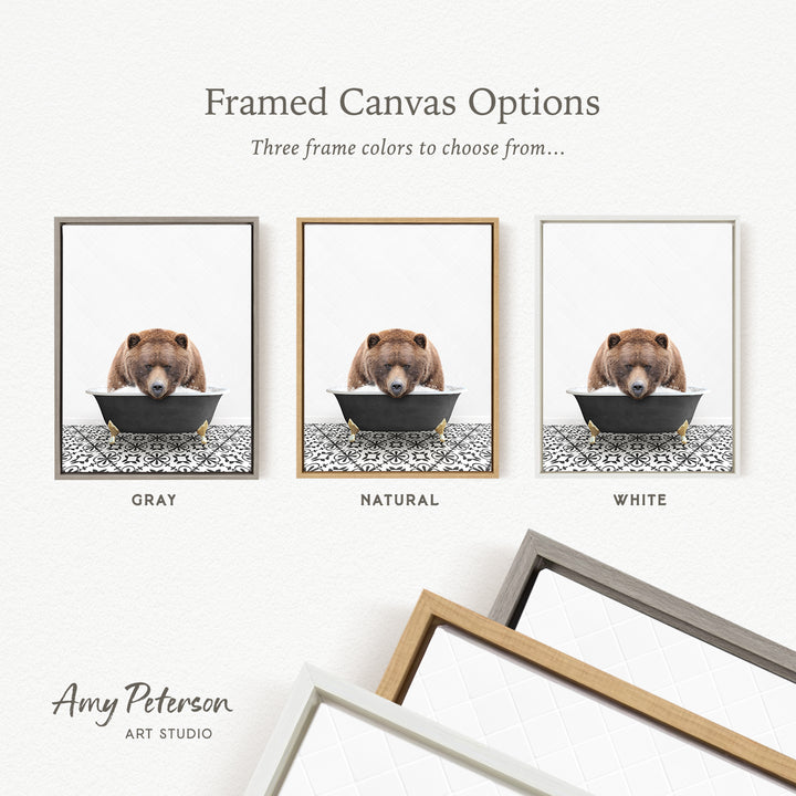 three framed canvas options, each featuring a brown bear sitting in a black bowl. The options include a gray frame, a natural frame, and a white frame.