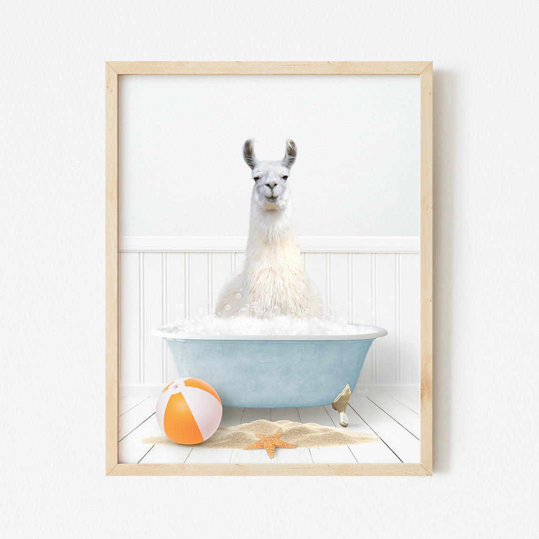 a llama in a bathtub with a beach ball