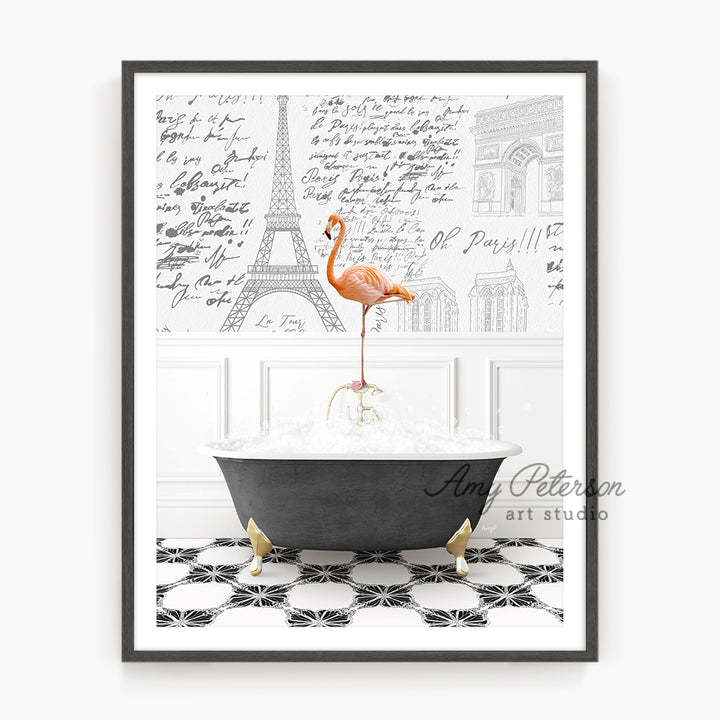 a pink flamingo standing on top of a bathtub