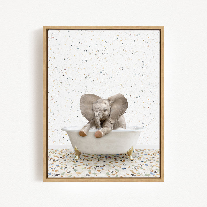A baby elephant sitting in a bathtub filled with water, surrounded by a speckled background.
