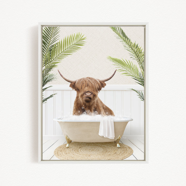 A brown cow with long horns is sitting in a bathtub filled with water, surrounded by green plants.