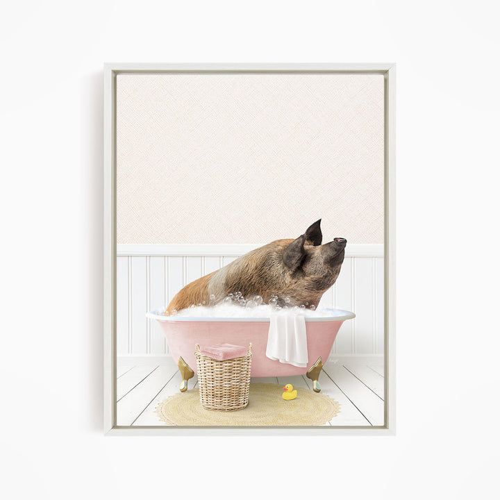 A brown pig sitting in a pink bathtub filled with bubbles, surrounded by a yellow rubber duck and a wicker basket.