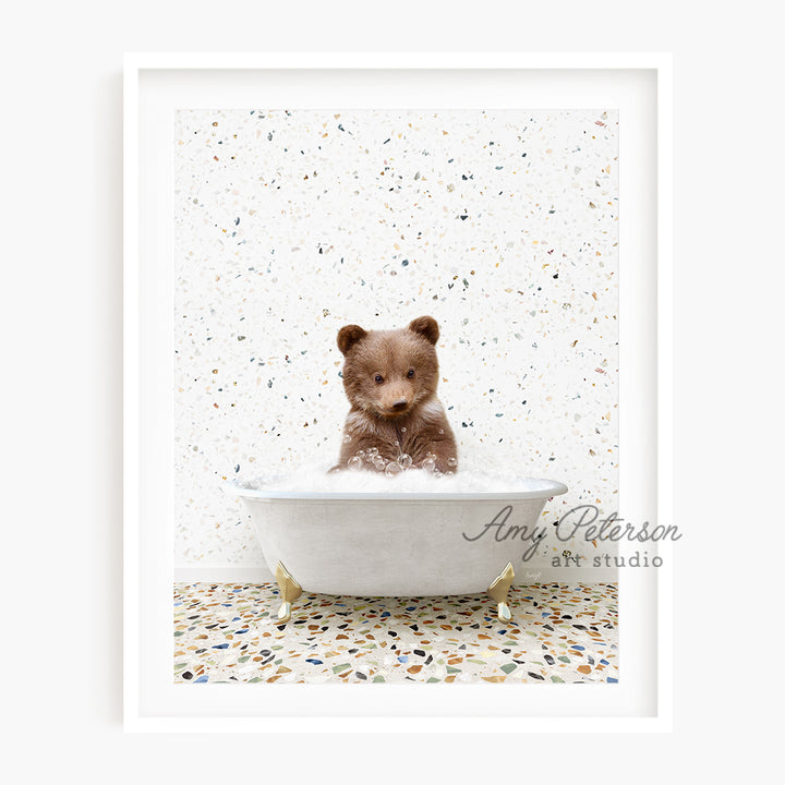 a brown teddy bear sitting in a bath tub