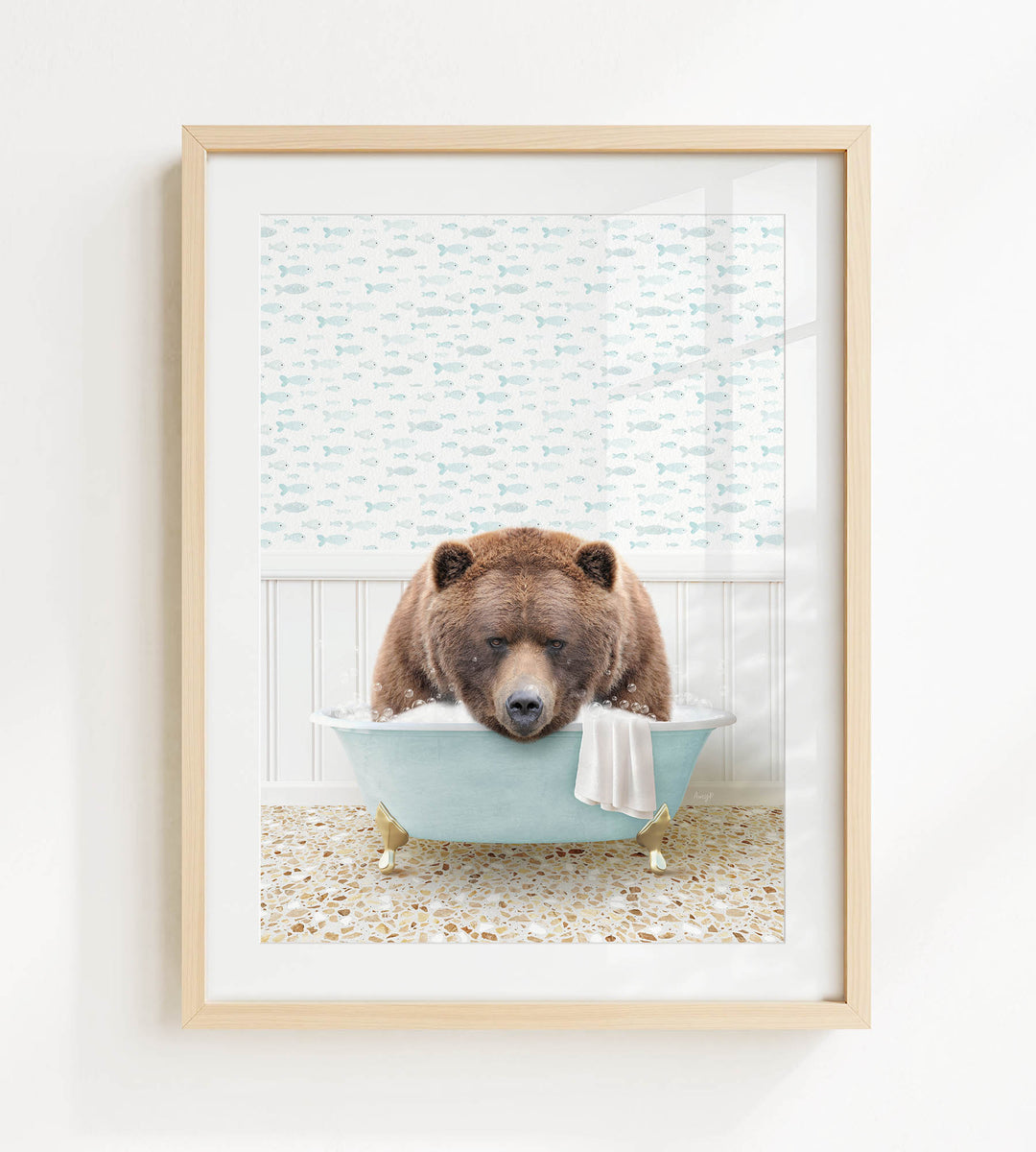 A brown bear is sitting in a blue bathtub filled with water, surrounded by a patterned wall and a window.