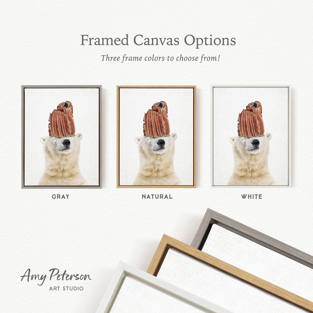 The image is a framed canvas option showcasing three different frame colors: gray, natural, and white. The image features a polar bear wearing a hat, and the text indicates that there are three frame colors to choose from.
