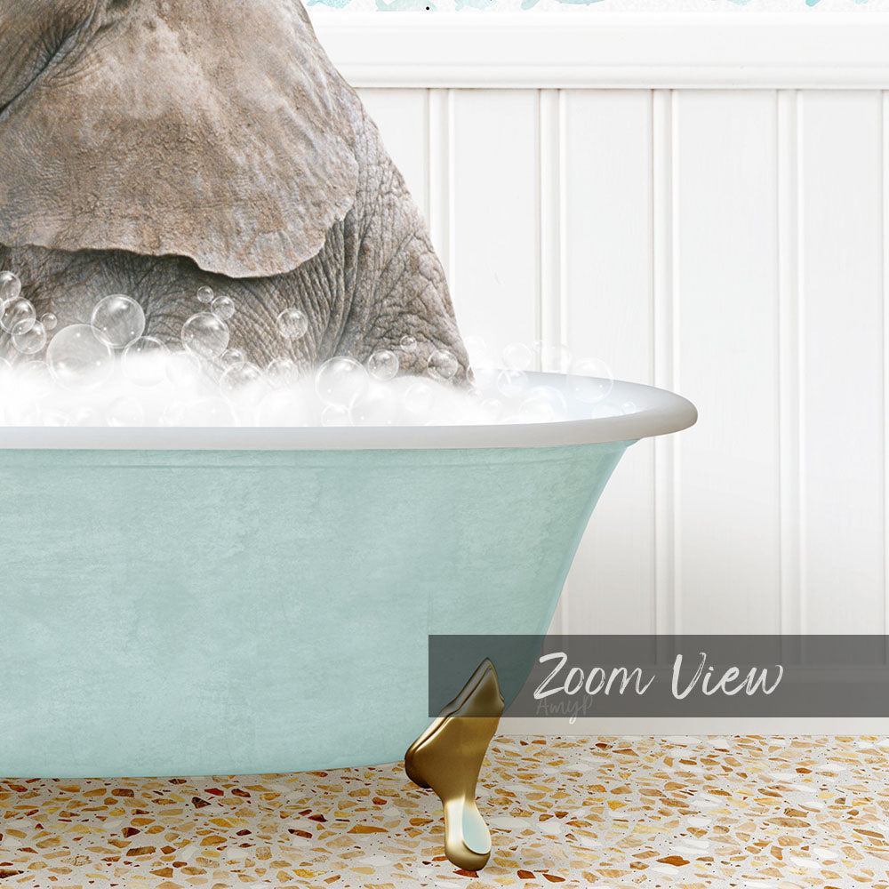 A large elephant is sitting in a bathtub filled with water, surrounded by bubbles.
