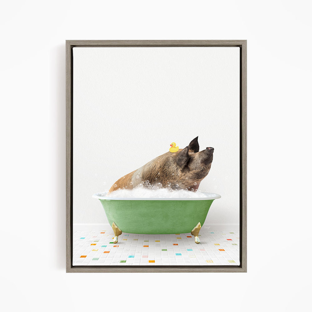 A brown dog is sitting in a green bathtub filled with bubbles, with a yellow rubber duck floating on the water.