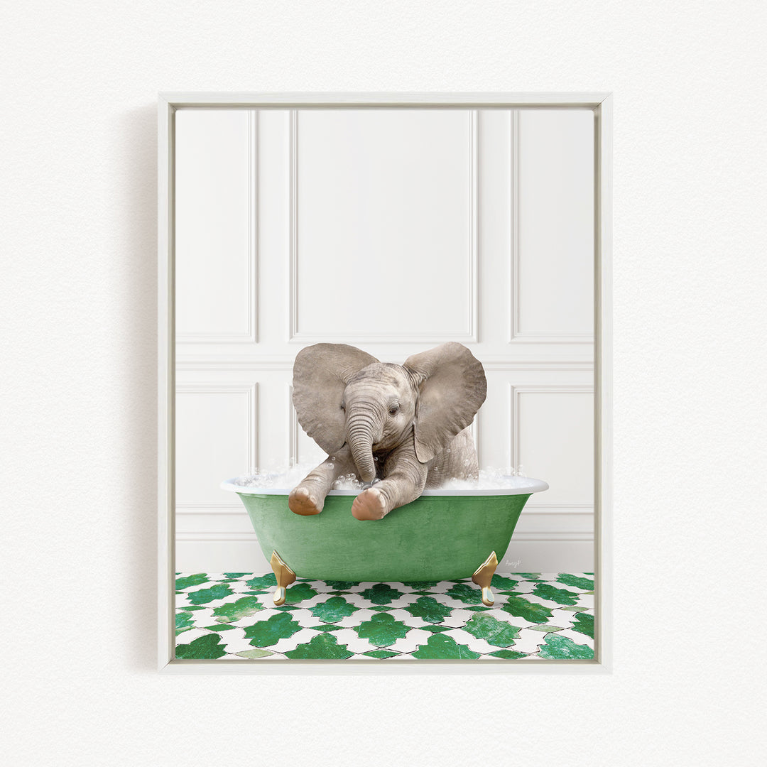 A baby elephant sitting in a green bathtub, surrounded by a green and white patterned floor.