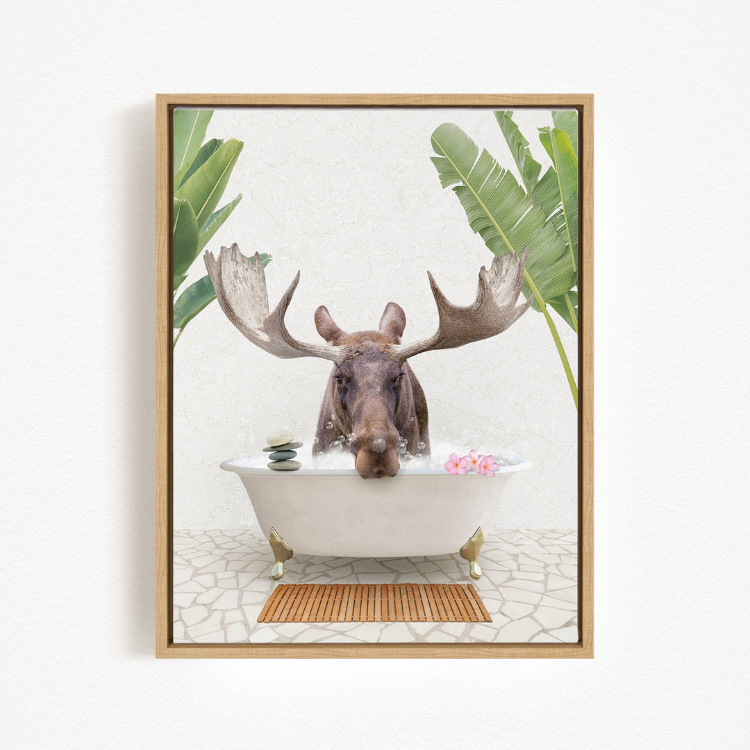 A moose is sitting in a bathtub filled with water, surrounded by tropical plants and flowers.
