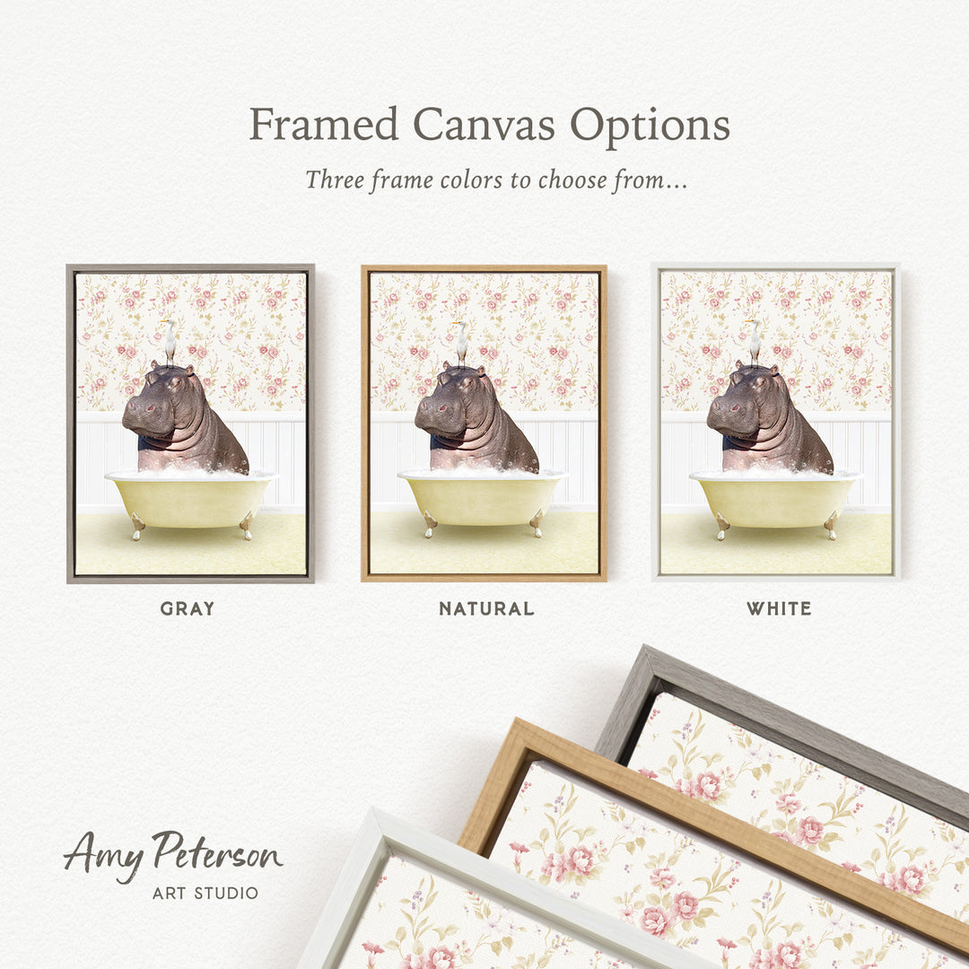 The image is a framed canvas option featuring three different framed pictures of a hippopotamus in a bathtub, each with a different frame color: gray, natural, and white.