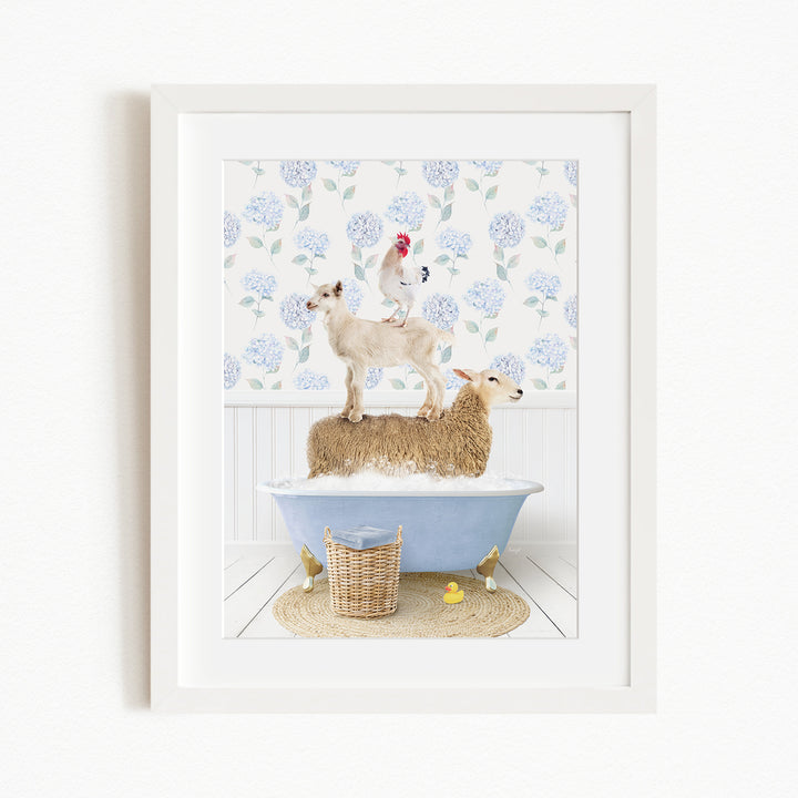 A framed image depicting a sheep standing in a bathtub, with a chicken perched on its back, and a rooster standing on its head.