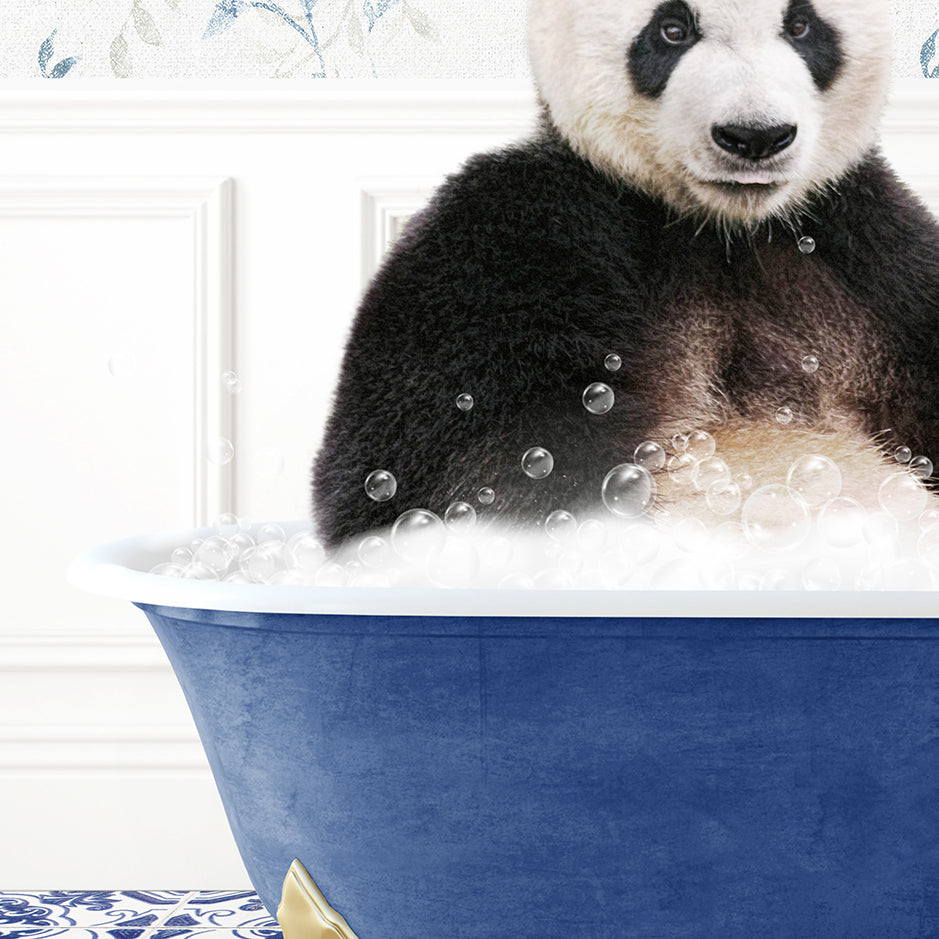 a panda bear sitting in a bathtub full of bubbles