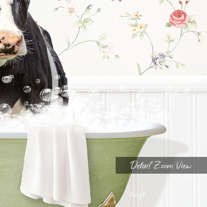 A black and white cow is sitting in a green bathtub filled with bubbles, with a floral wallpaper in the background.
