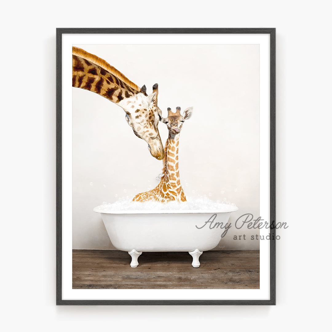 a picture of two giraffes in a bathtub