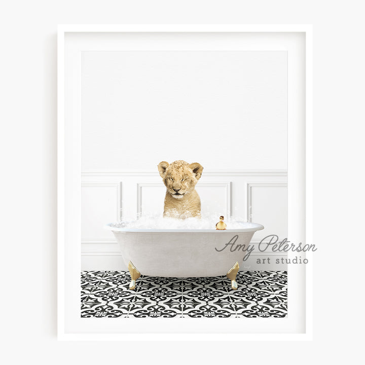 a picture of a lion cub in a bathtub