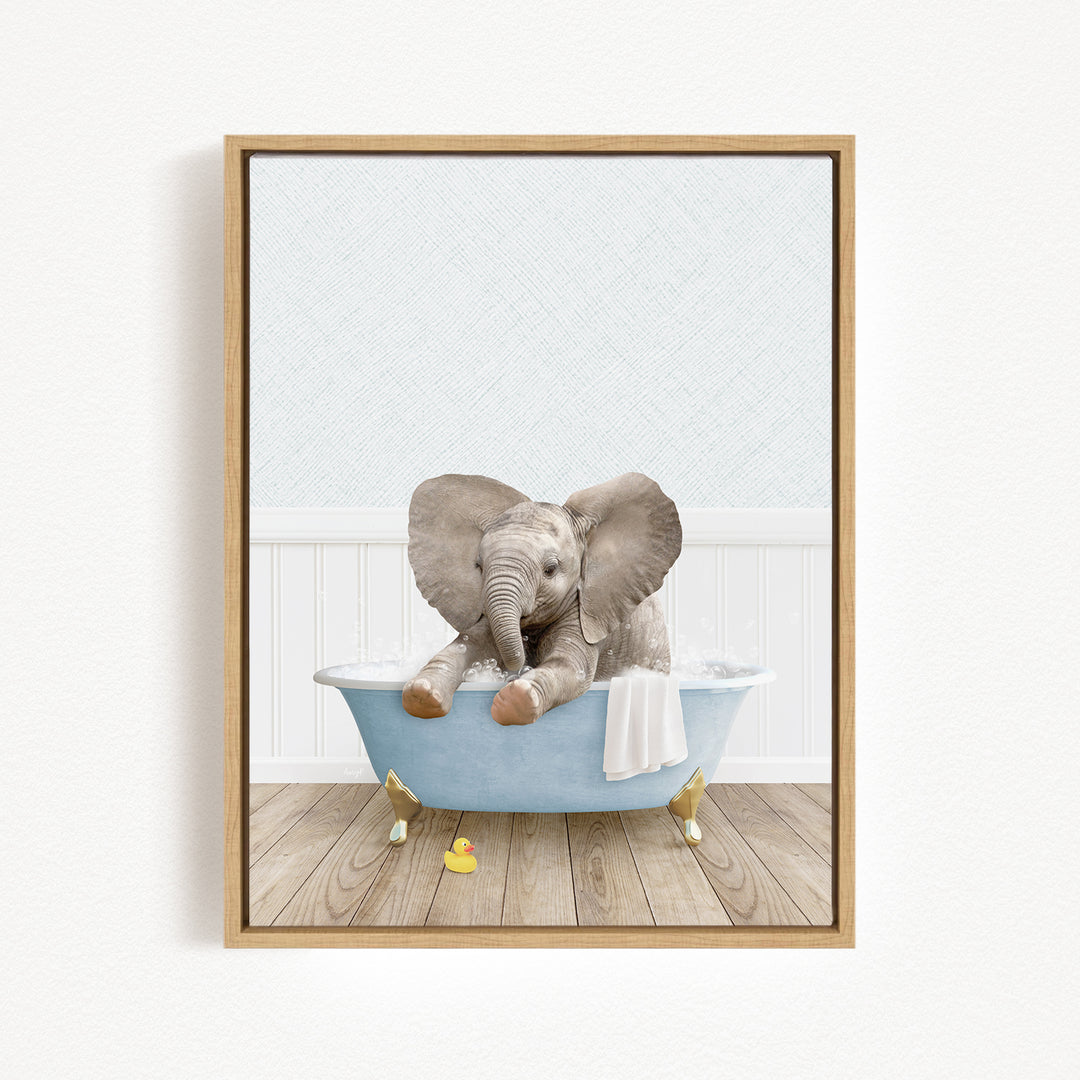 A baby elephant sitting in a blue bathtub, surrounded by a white wall and wooden floor.