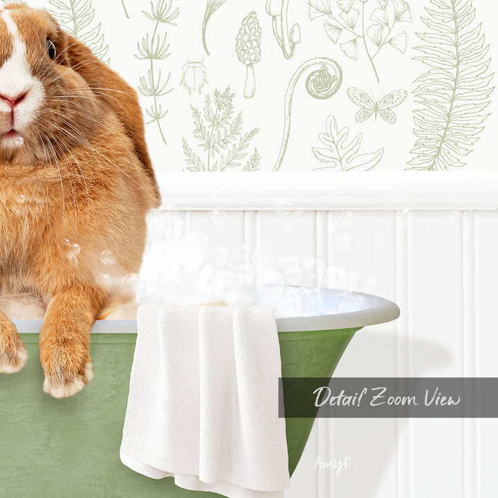 A brown rabbit sitting in a green bathtub filled with bubbles, with a towel and a plant-themed wallpaper in the background.