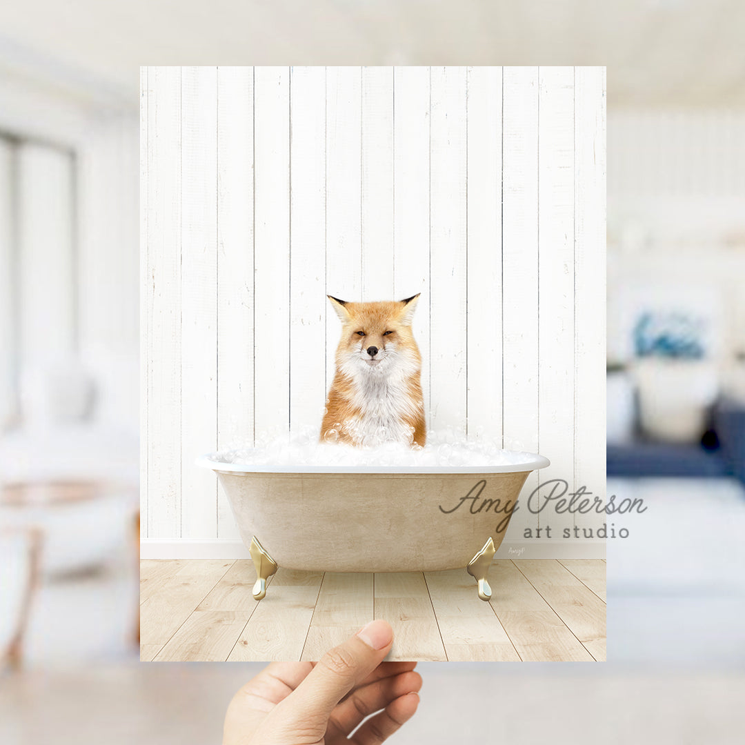 a hand holding a photo of a dog in a bathtub