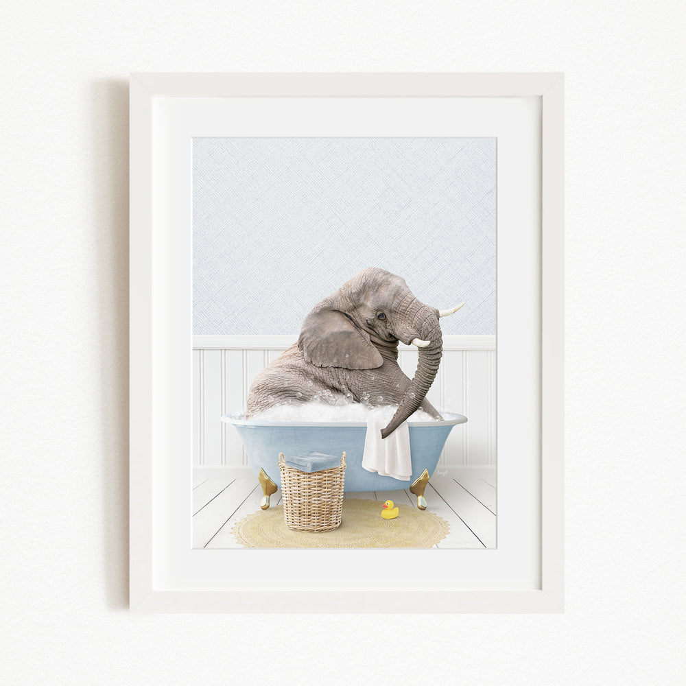 A gray elephant sitting in a blue bathtub filled with water, surrounded by a yellow rubber duck and a basket.