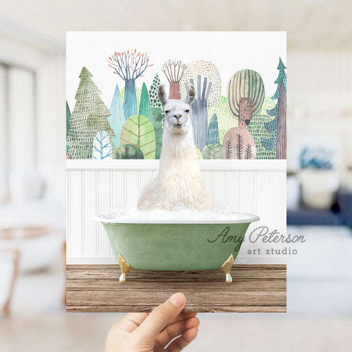 a person holding a card with a llama in a bathtub