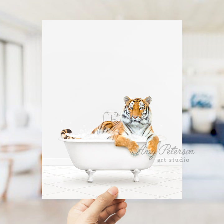 a person holding a card with a picture of a tiger in a bathtub