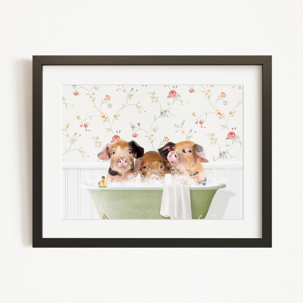 Three adorable pigs sitting in a green bathtub, enjoying a relaxing bath together.