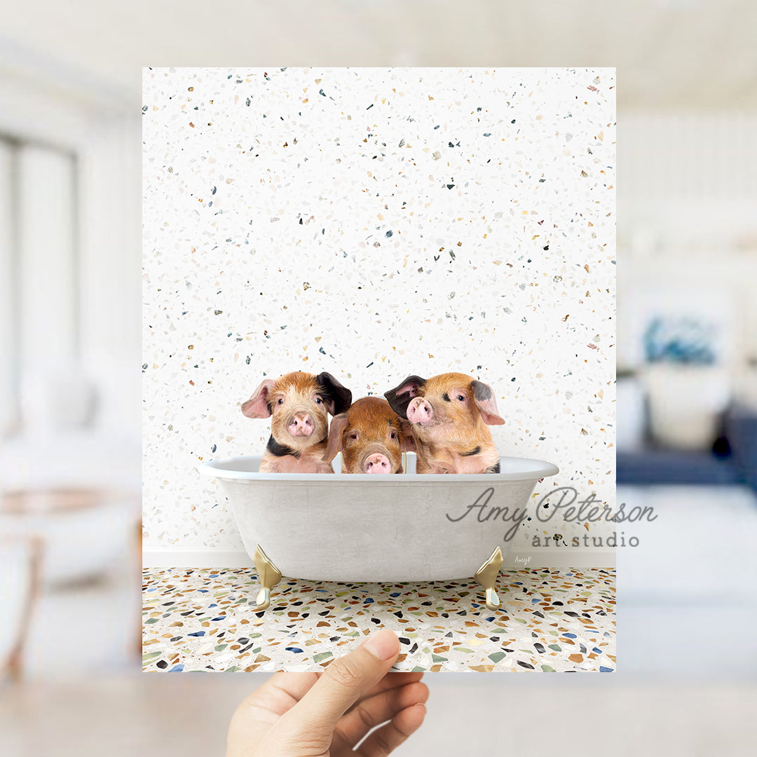 a person holding up a card with three dogs in a bathtub