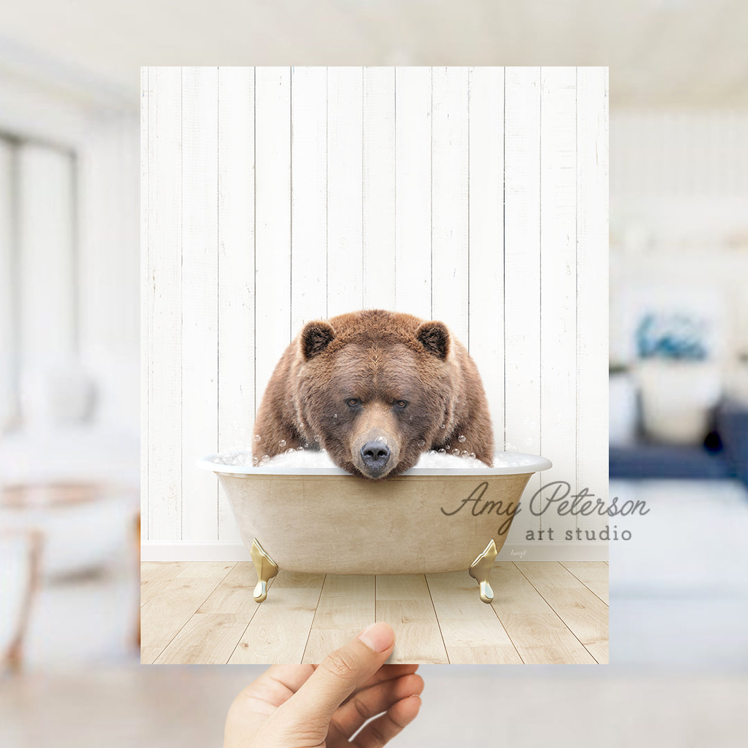 a brown bear is taking a bath in a bathtub