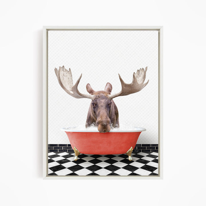 A moose with large antlers is sitting in a red bathtub, surrounded by a black and white checkered floor.