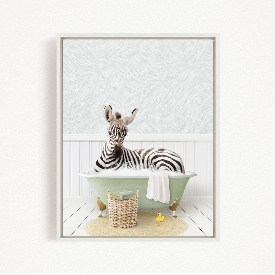 A zebra is sitting in a green bathtub, surrounded by a basket of toys and a yellow rubber duck, creating a whimsical and playful scene.
