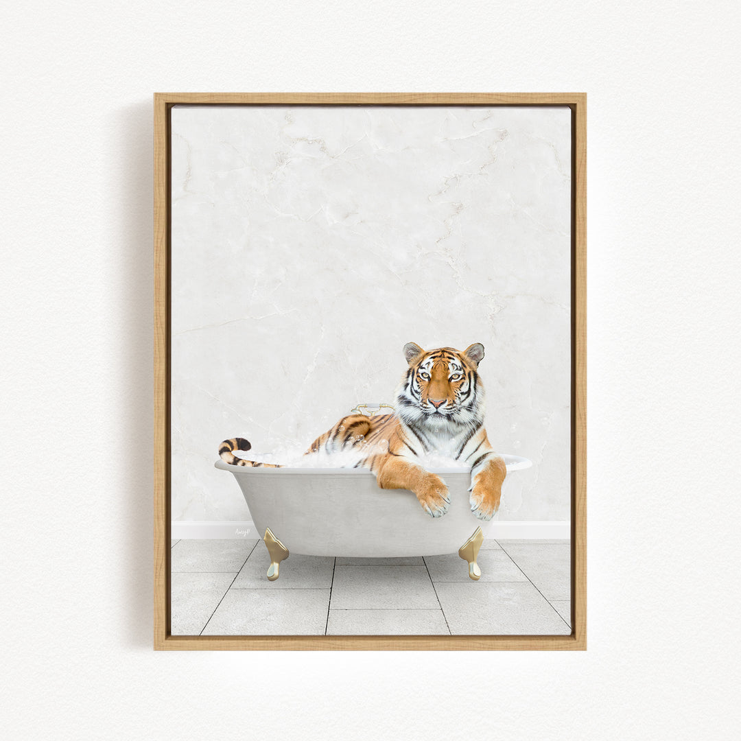 A tiger is sitting in a white bathtub, appearing relaxed and comfortable.