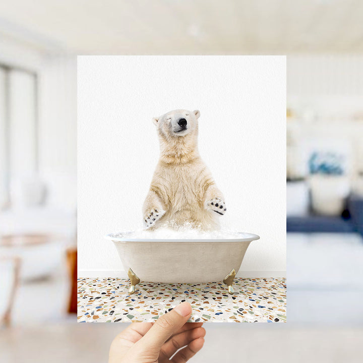 A polar bear standing in a bathtub filled with water, with its paws submerged in the water.