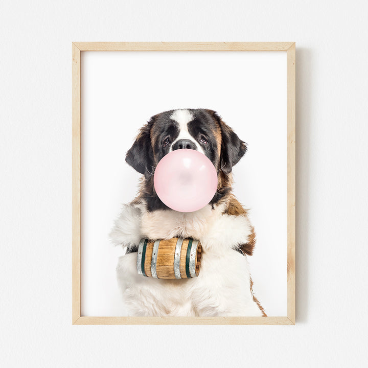 a dog with a bubble gum in its mouth