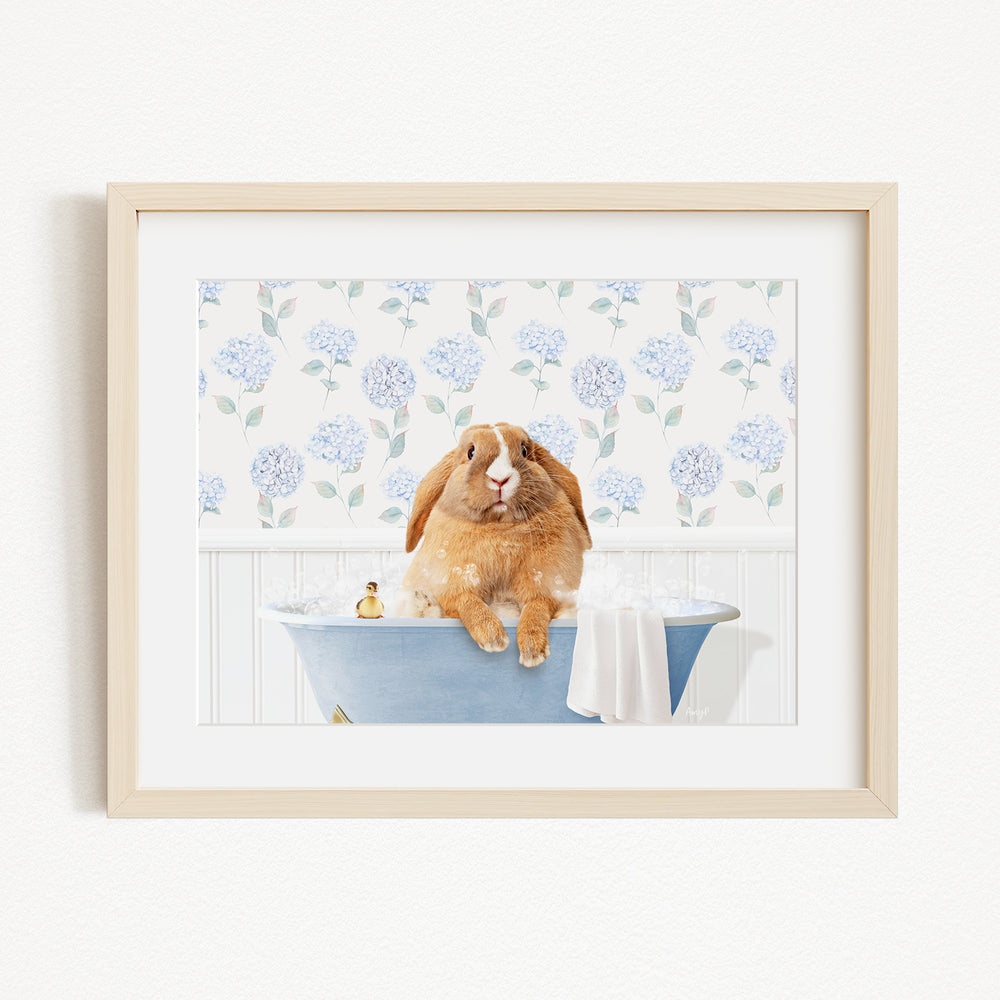 A brown rabbit sitting in a blue bathtub filled with water, surrounded by blue hydrangea flowers.