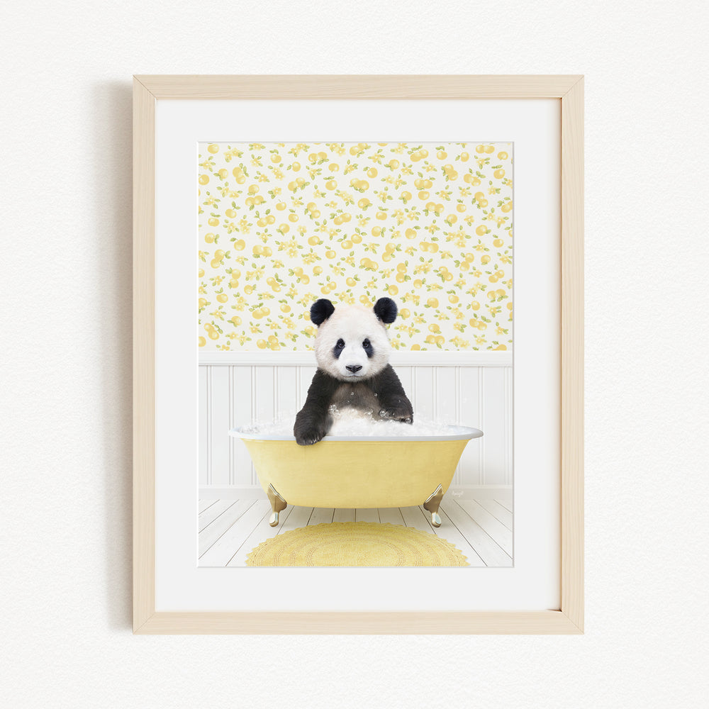 A panda bear sitting in a yellow bathtub, surrounded by a yellow floral wallpaper.