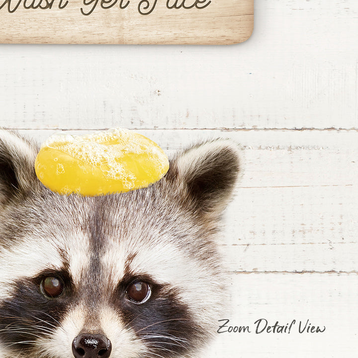 A raccoon wearing a yellow object on its head, with a wooden sign above it that says "Wish you good luck".