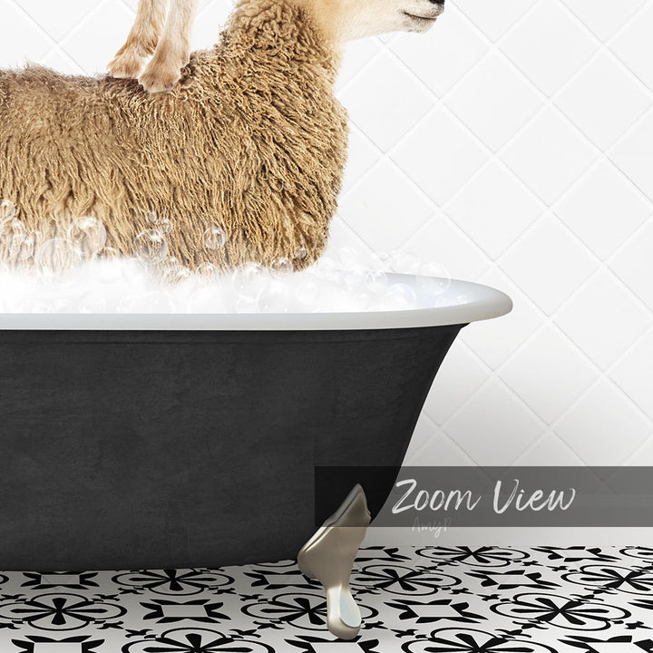 A fluffy brown sheep is standing in a black bathtub filled with water, with bubbles around it.